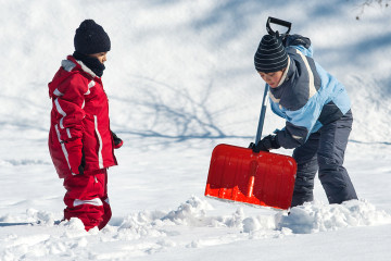 kids shoveling snow